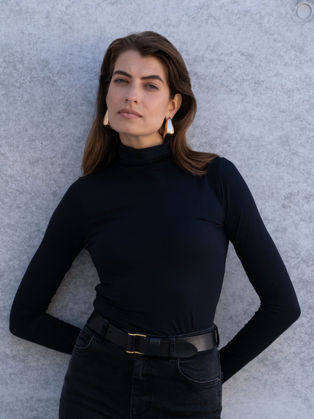 Classic black roll neck top for women