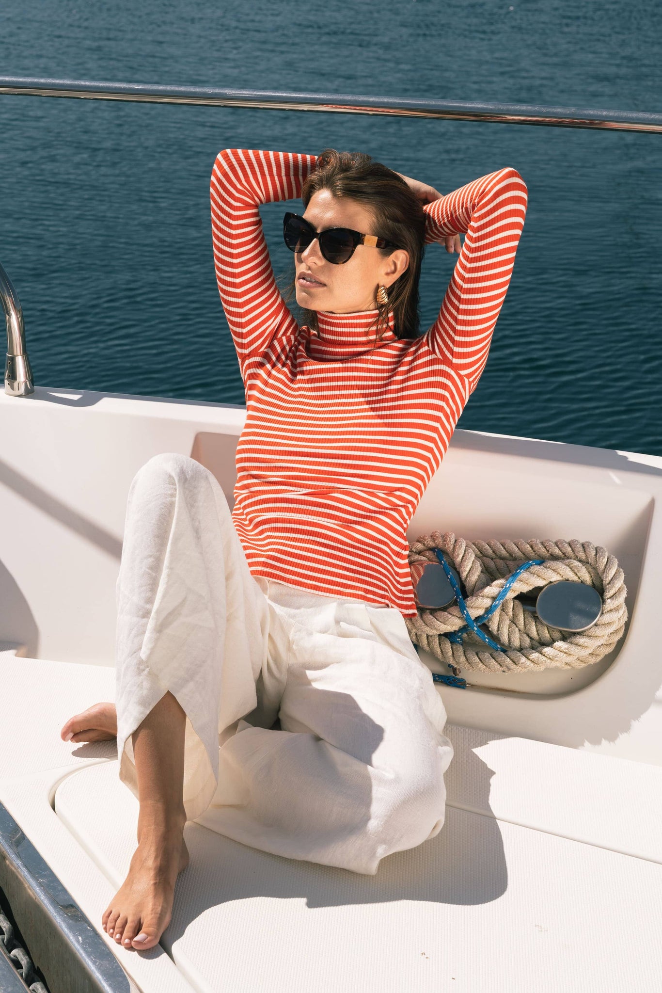 Women's red and white stripe roll neck top
