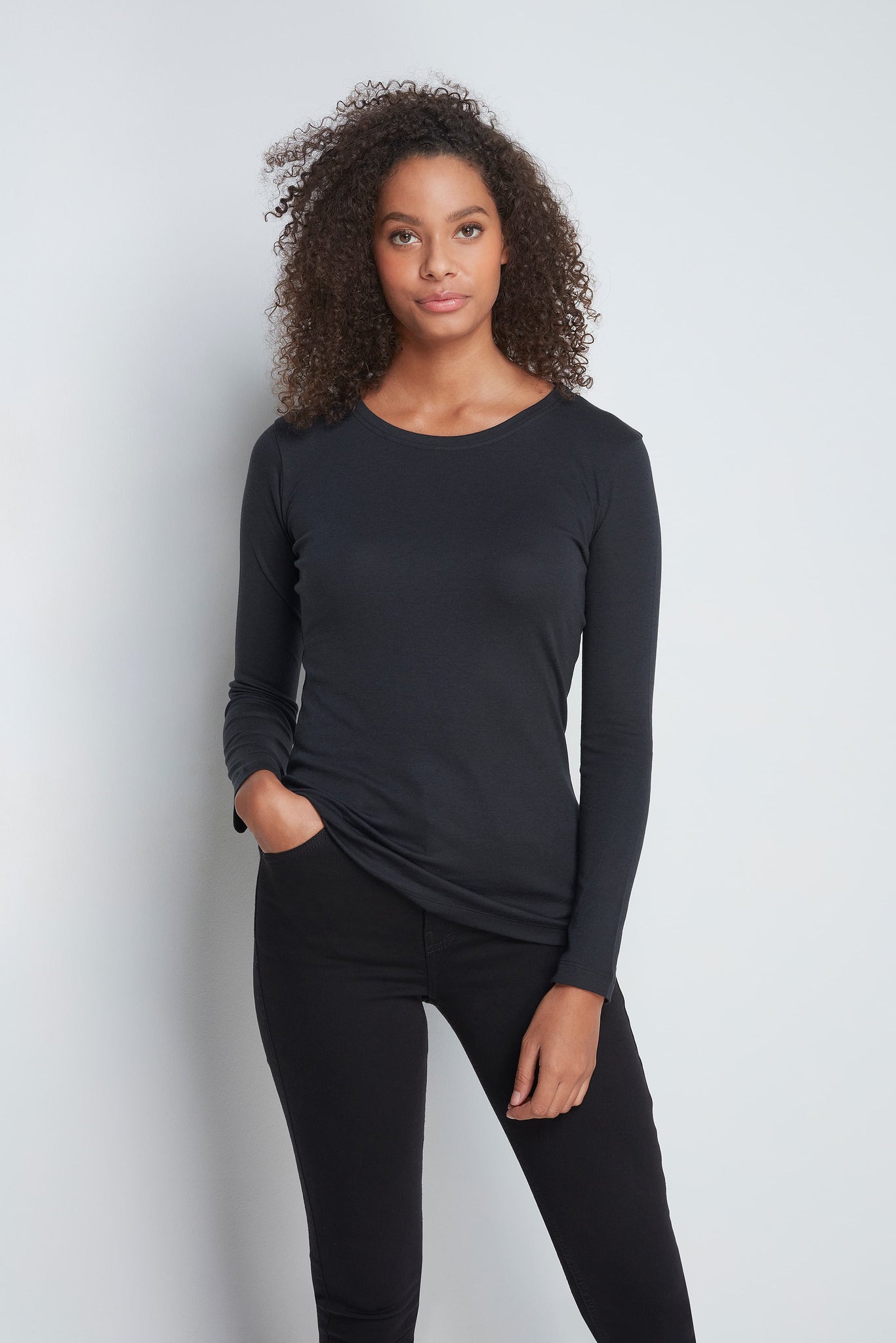 Women's black long sleeve crew neck t-shirt made from a soft cotton modal blend fabric